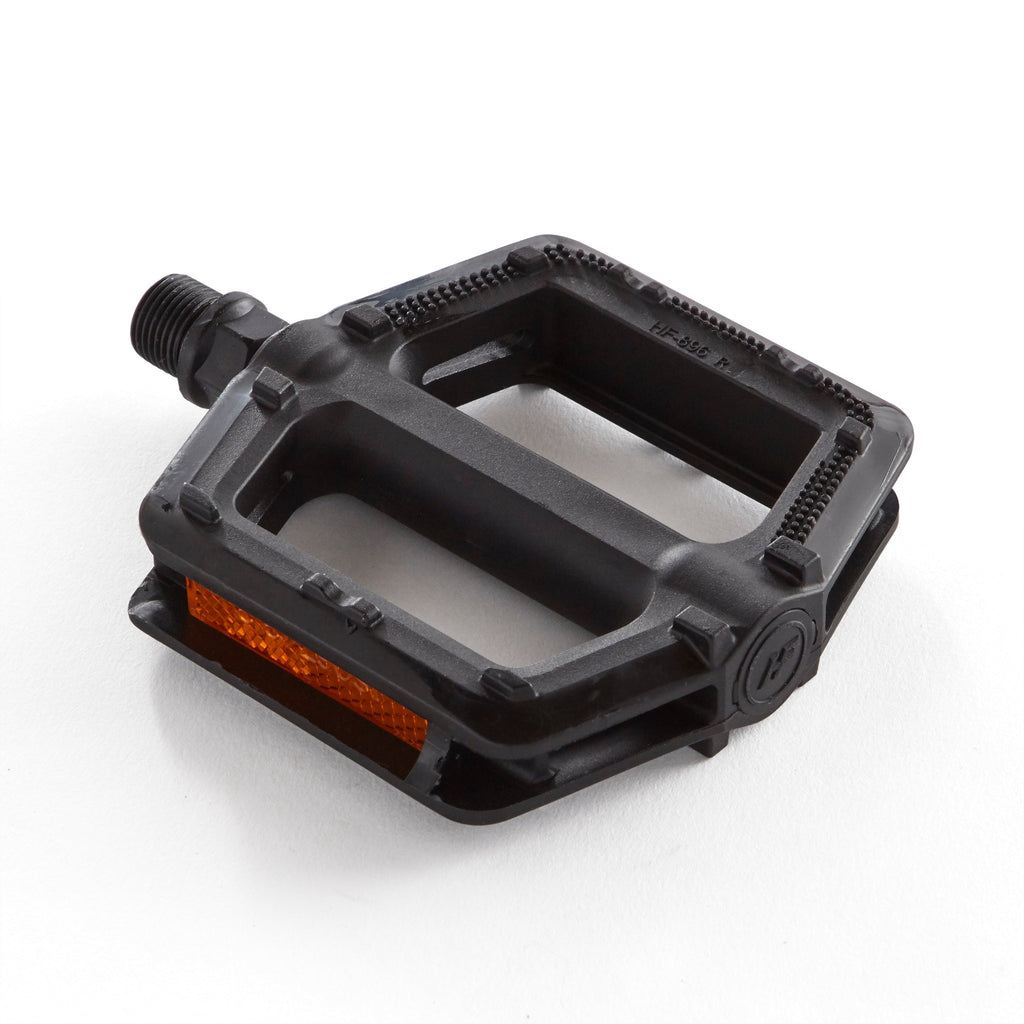 A black Bicycle Pedal for Kids. One pedal with a white background.