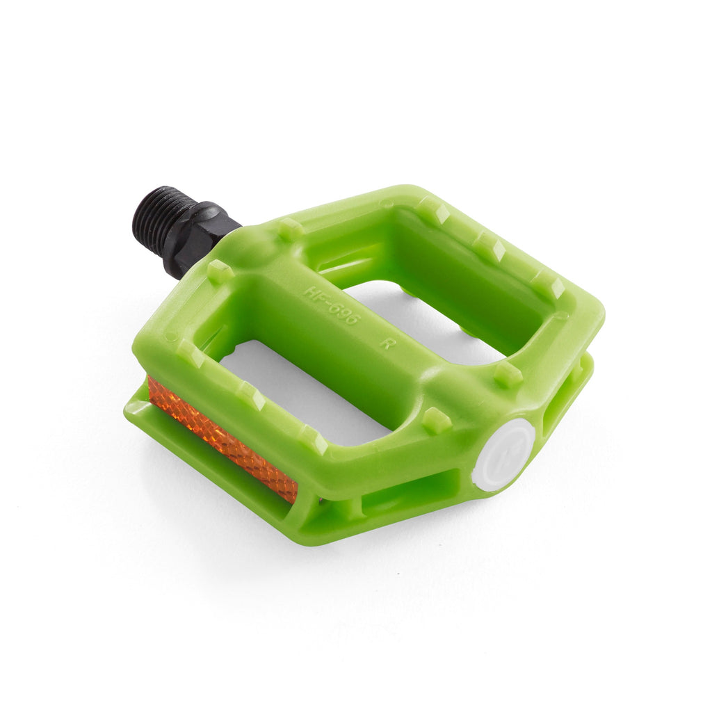 one green kids bicycle pedal corner view with white background