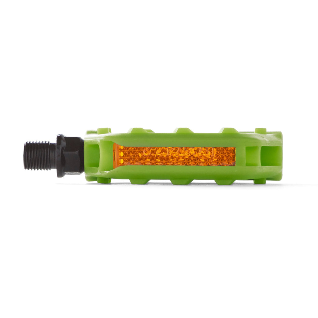 Kids bicycle pedal with light reflector in green from side view white background