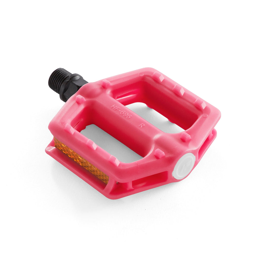 Kids bike pedal in the color pink. Angled view with white background.