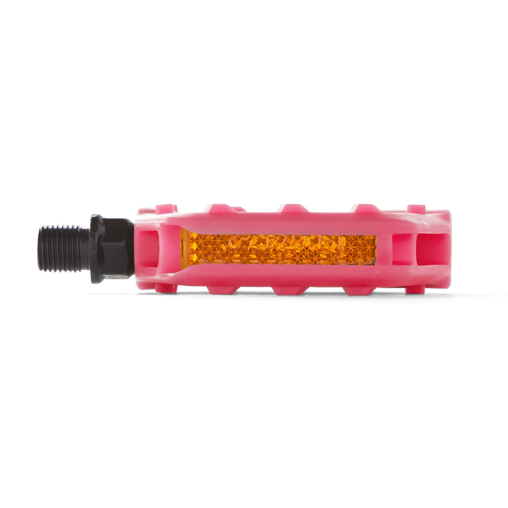 Kids bike pedal with safety light reflector in the color pink. Side view with white background.