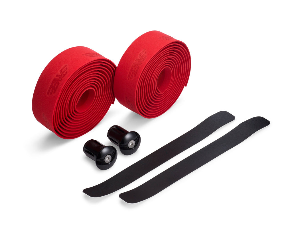 Two rolls of red handlebar tape for road bikes. Red EVA handlebar tape on white background.