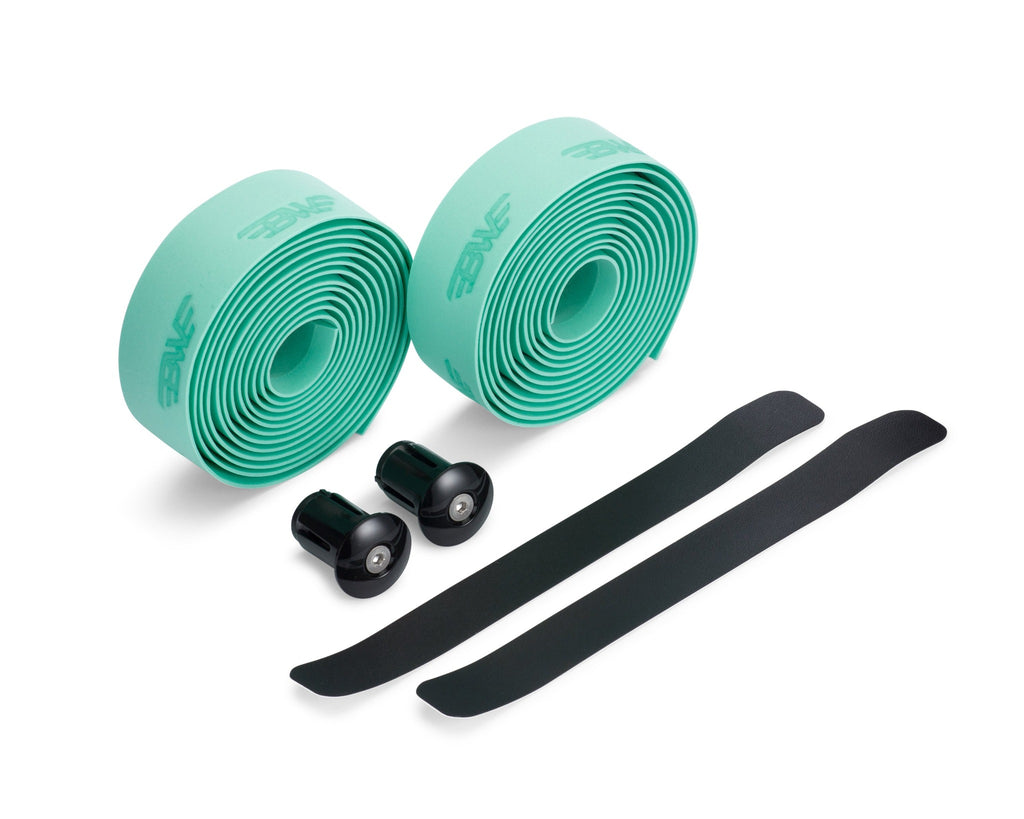Two rolls of turquoise handlebar tape for road bikes. Turquoise EVA handlebar tape on white background.