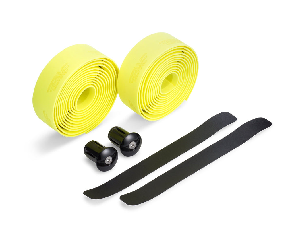 Two rolls of yellow handlebar tape for road bikes. Yellow EVA handlebar tape on white background.