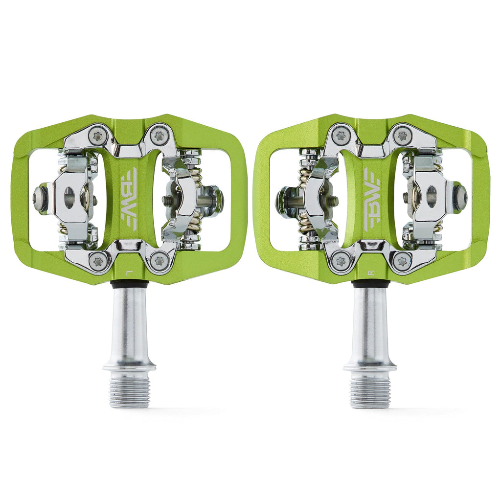Green clipless mountain bike pedals, top view on white background. SPD compatible bicycle pedals.