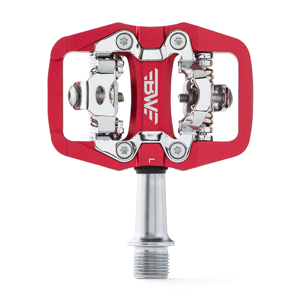 Red clipless mountain bike pedal, top view on white background. SPD compatible bicycle pedal.