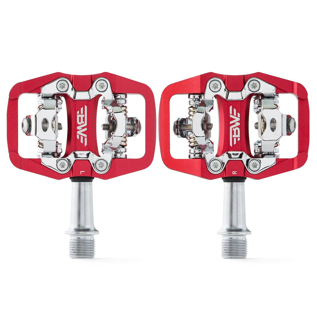 Red clipless mountain bike pedal, top view on white background. SPD compatible bicycle pedals.