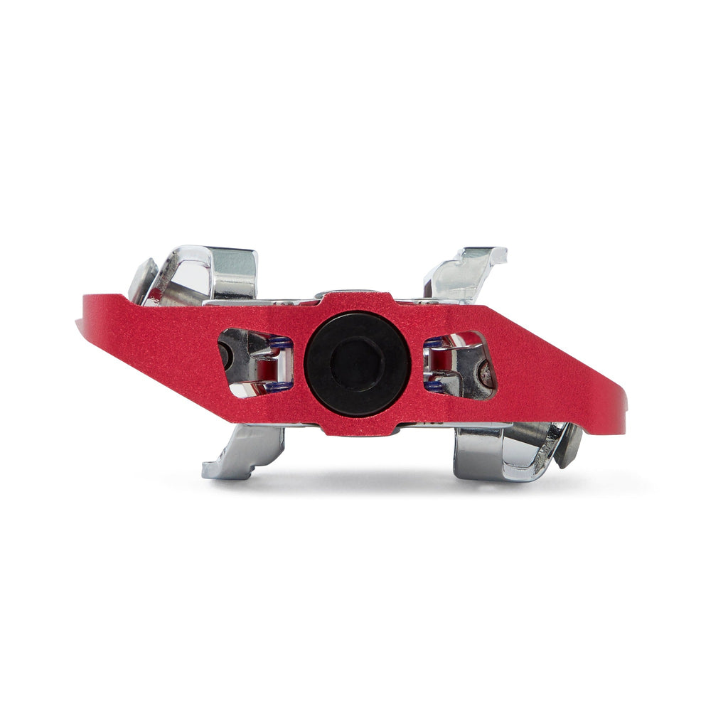 Red clipless mountain bike pedal, side view on white background. SPD compatible bicycle pedal.
