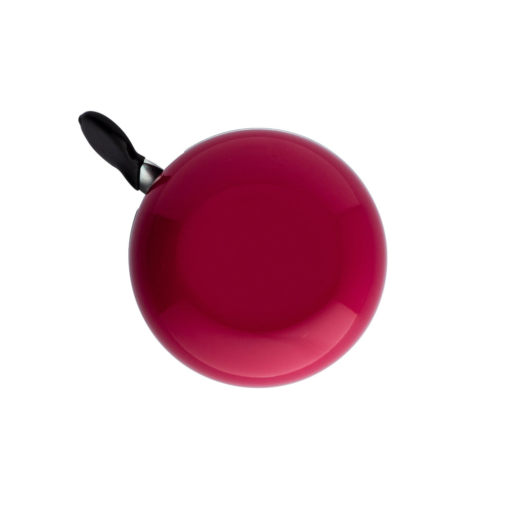 Handlebar bike bell with classic ding dong sound. Color berry on a white background. Bike bell top view.