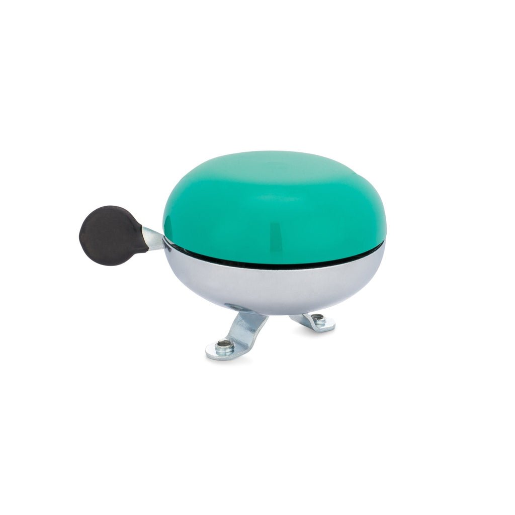 Handlebar bike bell with classic ding dong sound. Color emerald on a white background. Side view of vintage style bike bell.