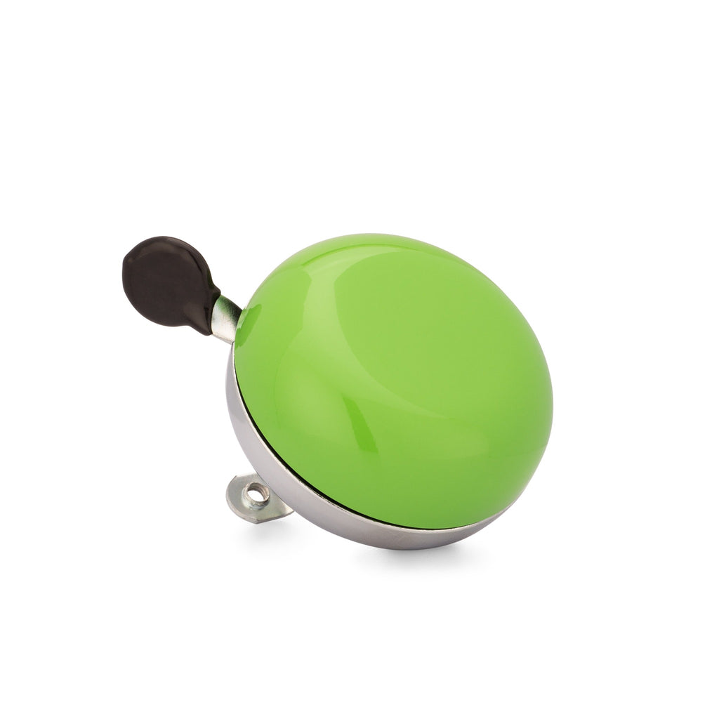 Handlebar bike bell with classic ding dong sound. Bell color green on a white background. Corner view of vintage style bike bell.