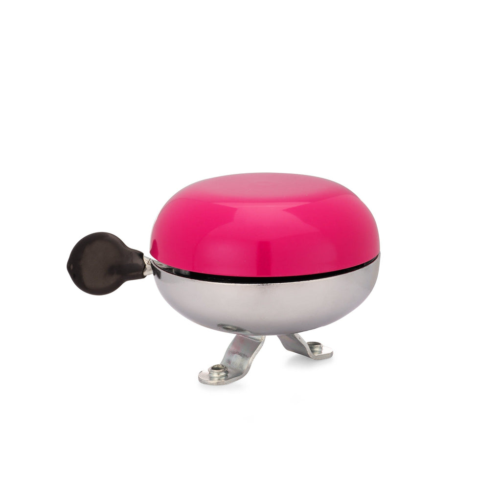 Magenta bike bell with classic ding dong sound. Side view with white background. Vintage style bike bell.