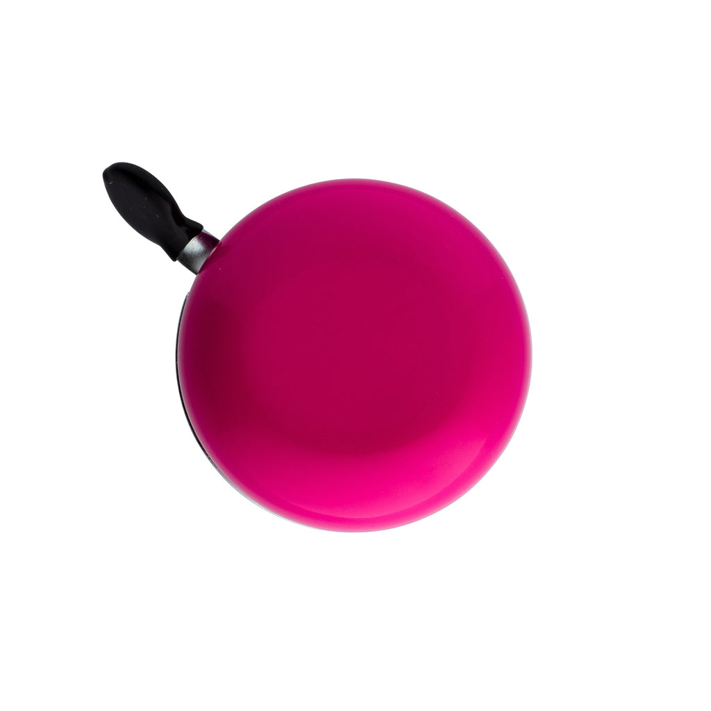 Magenta bike bell with classic ding dong sound. Top view with white background. Vintage style bike bell.