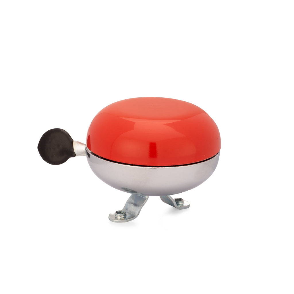 Red bike bell with classic ding dong sound. Side view with white background. Vintage style bike bell.