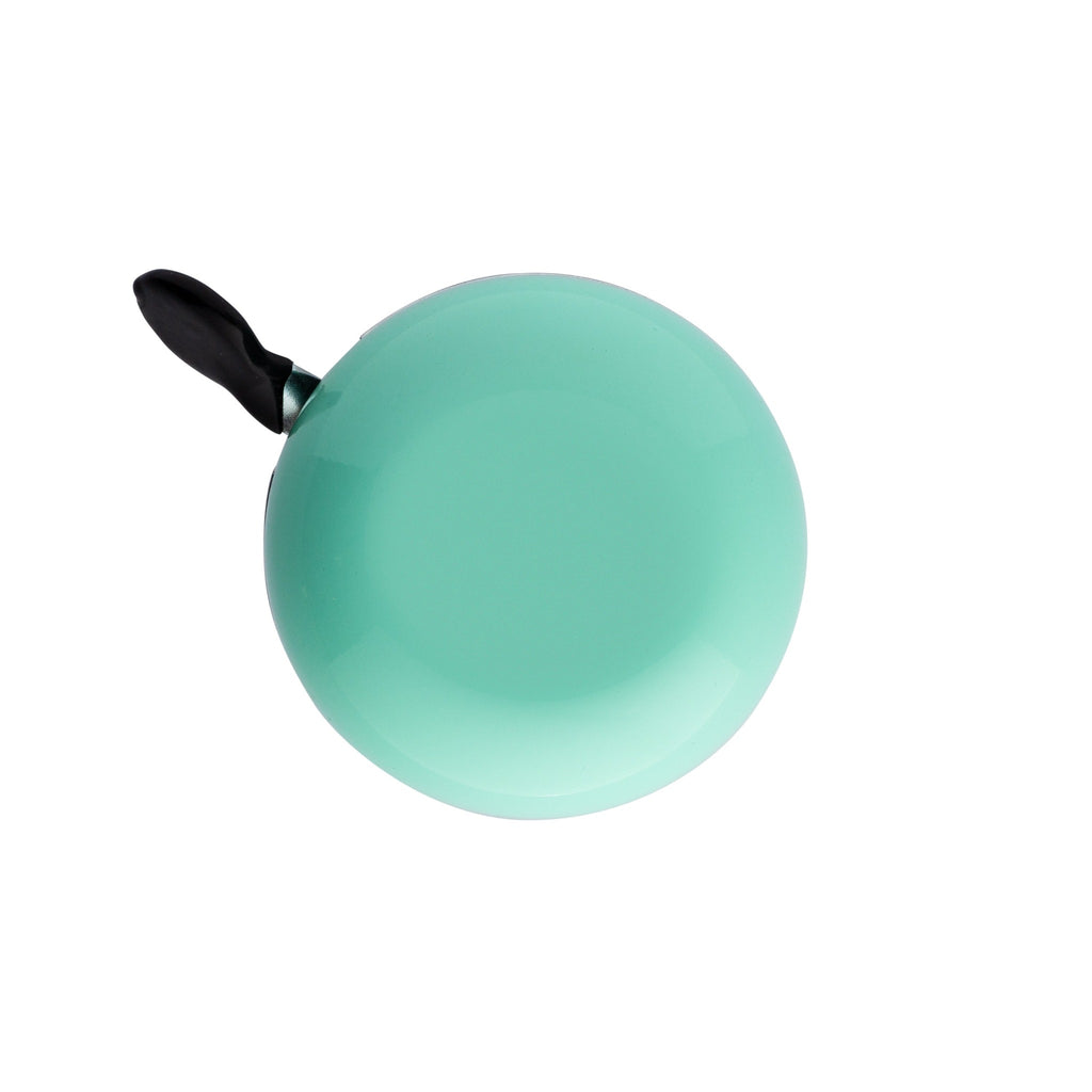 Seafoam green bike bell with classic ding dong sound. Top view with white background. Vintage style bike bell.