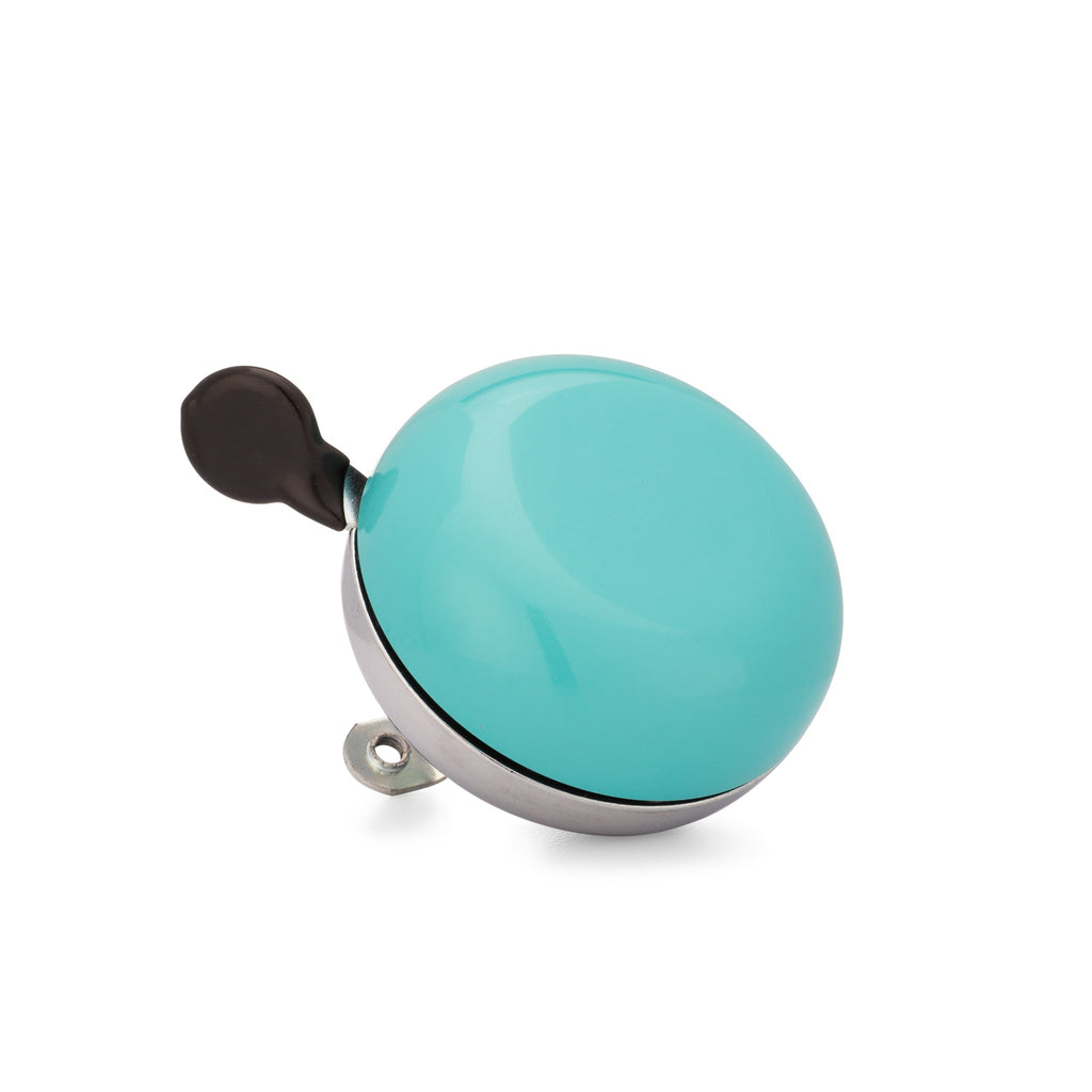 Teal bike bell with classic ding dong sound. Corner view with white background. Vintage style bike bell.