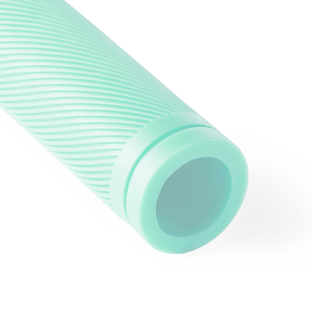 Close up of seafoam green bicycle grip.