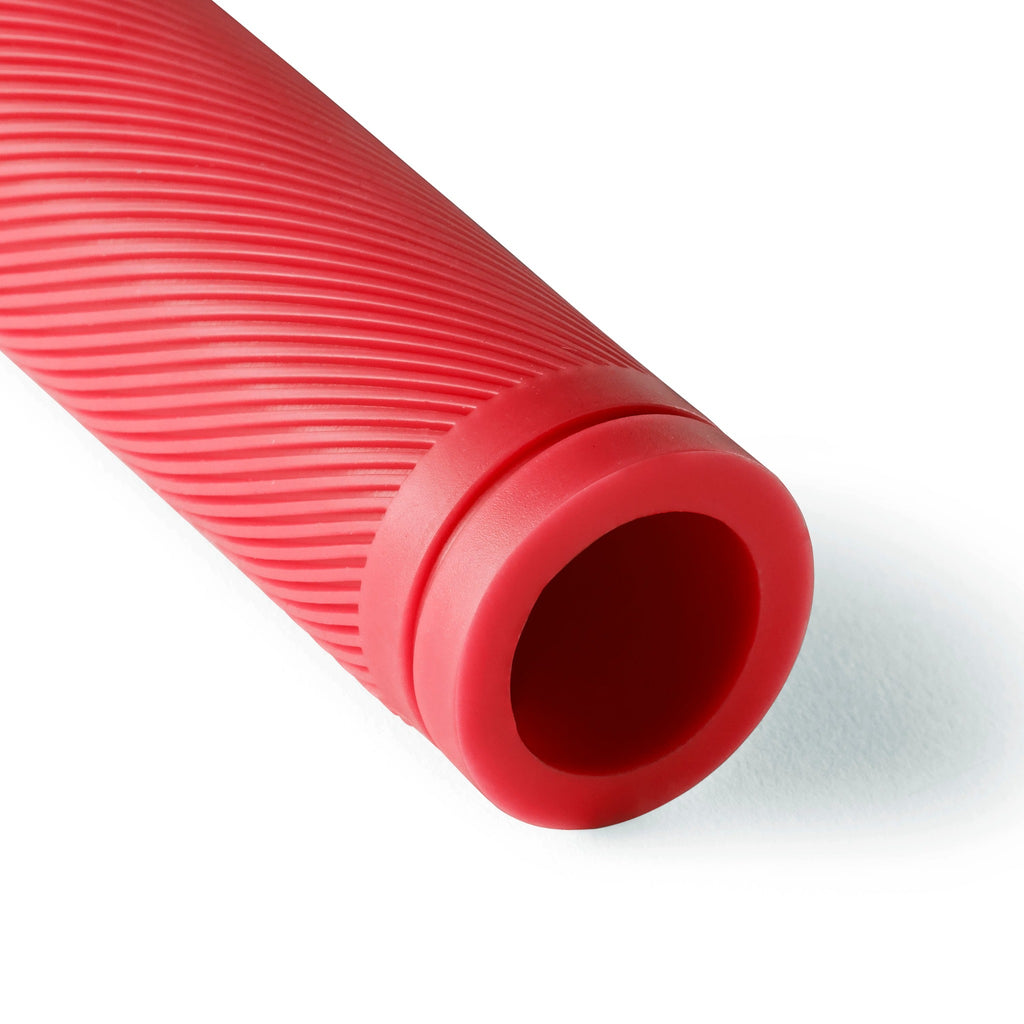 Close up of red bicycle grip for kids bikes.