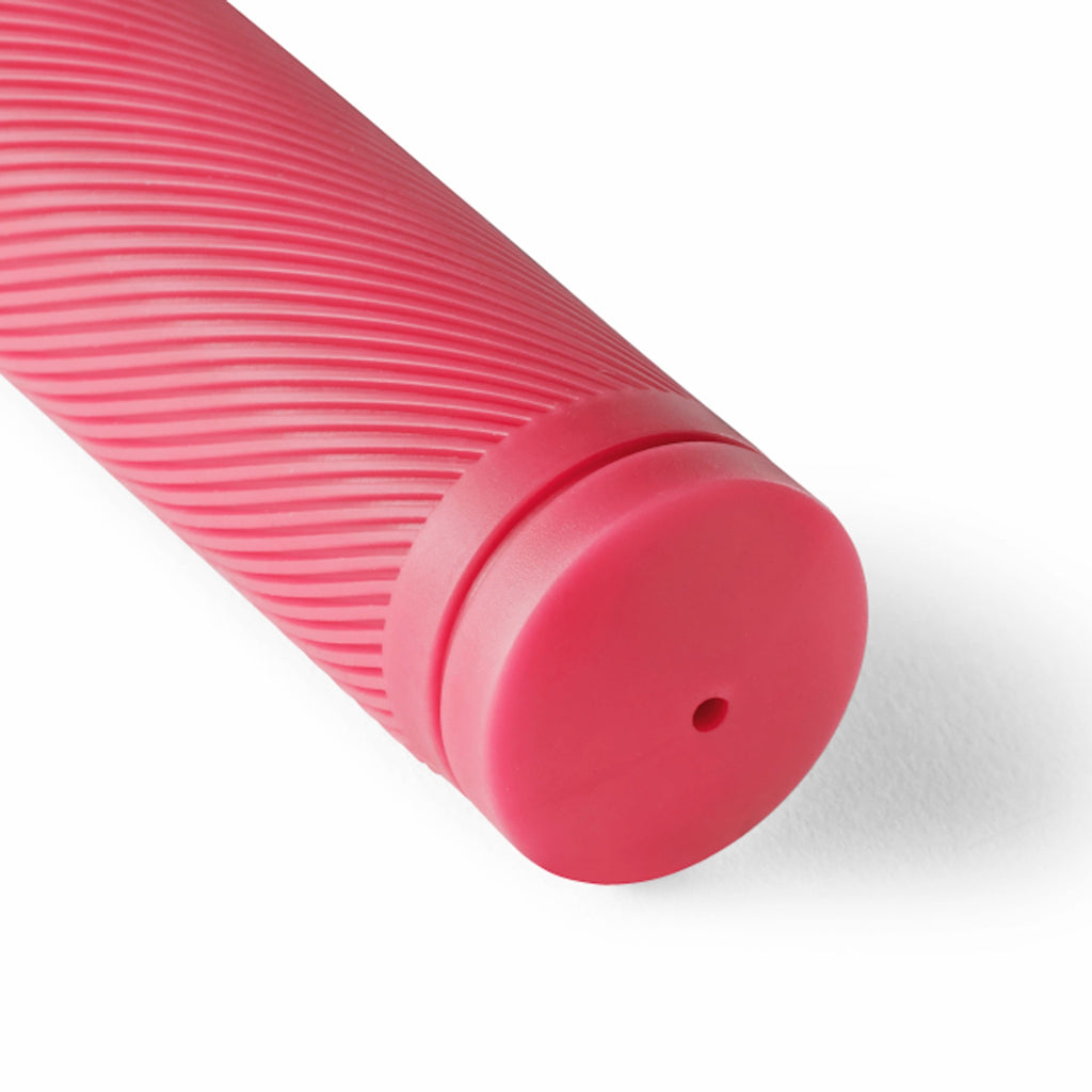 Detailed close up of pink bicycle grip.