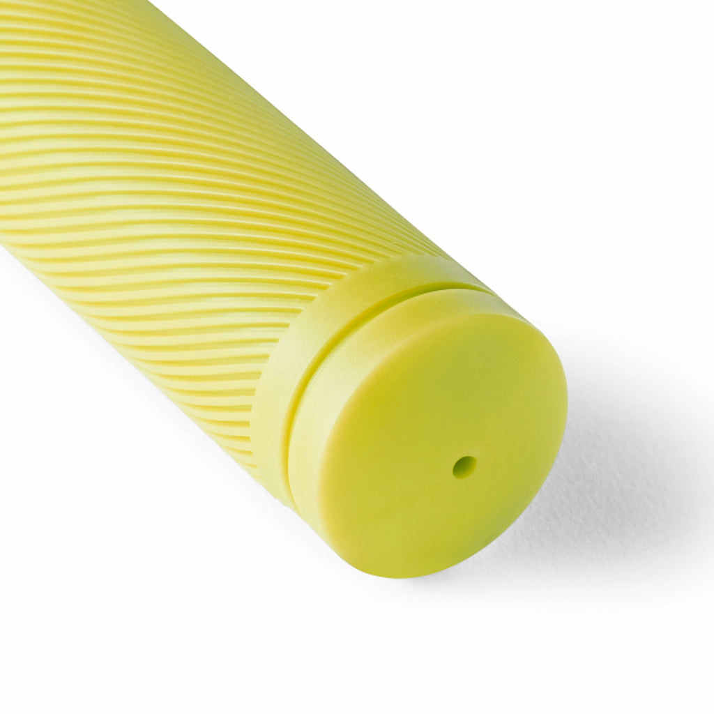 Close up detail of lime yellow bicycle grip.