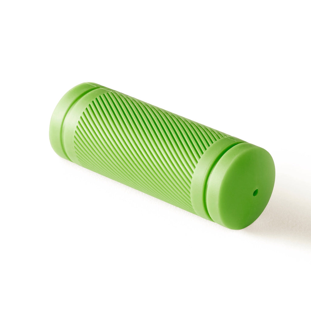 Green bicycle grip for kids bike.