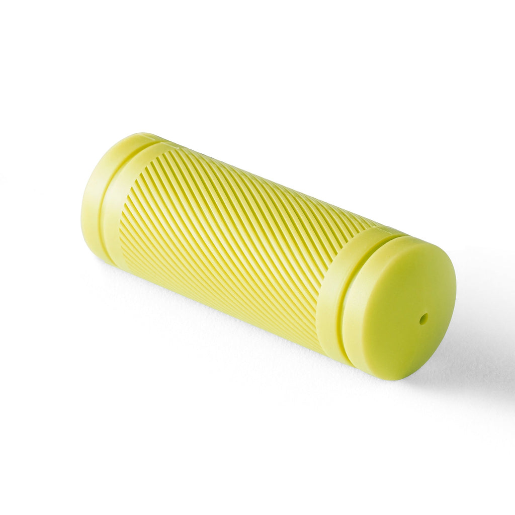 Lime yellow bicycle grip for kids bike.