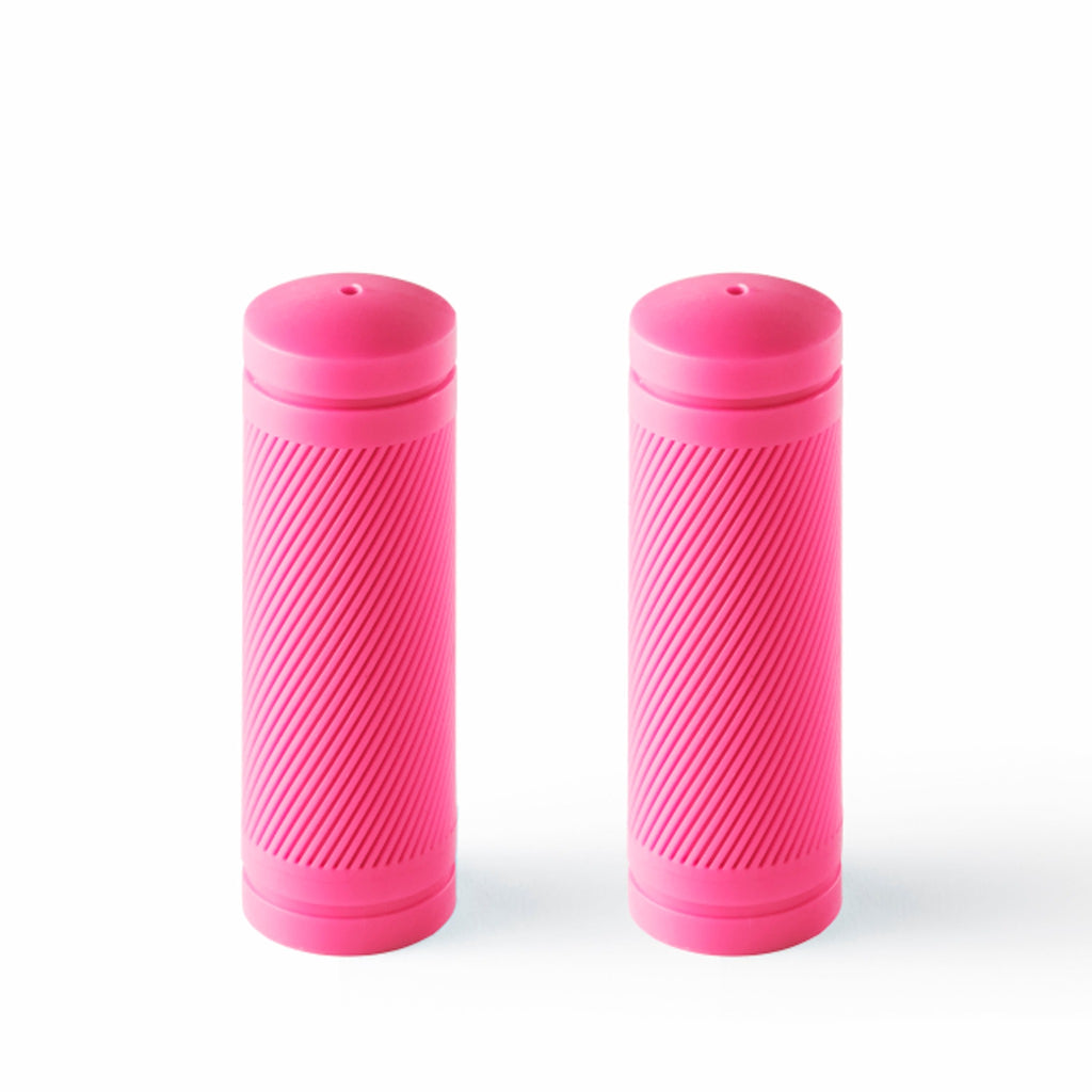 A pair of neon pink bike grips.