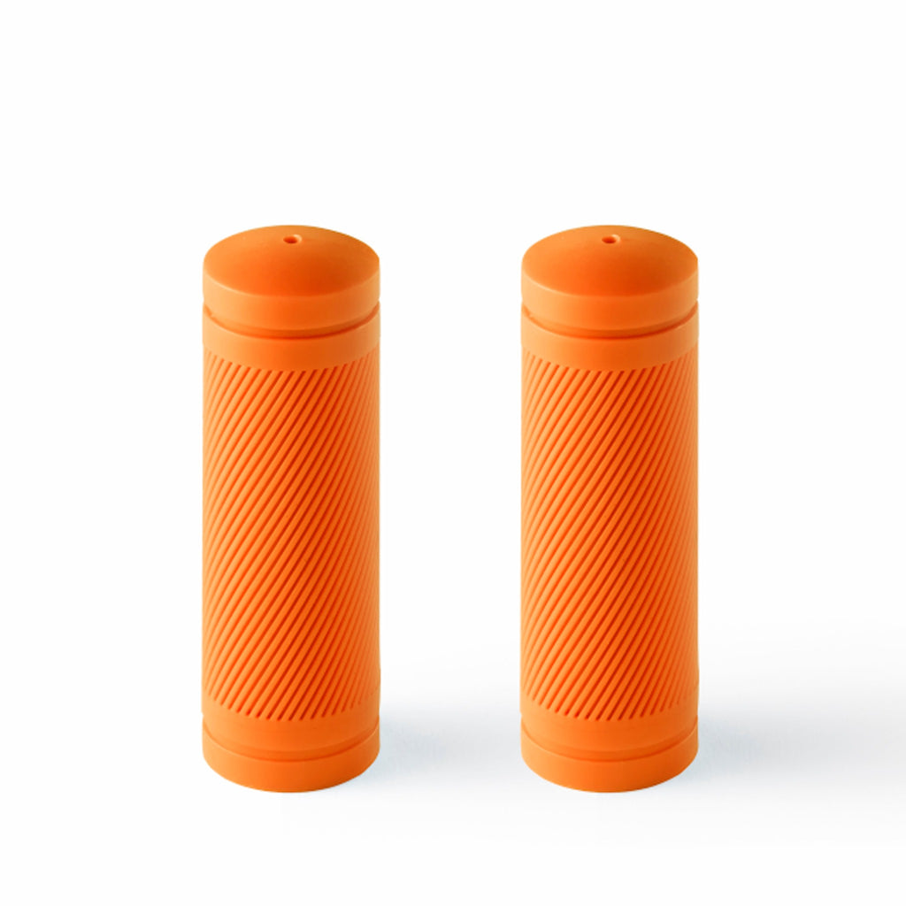 Orange handlebar grips for kids bike.