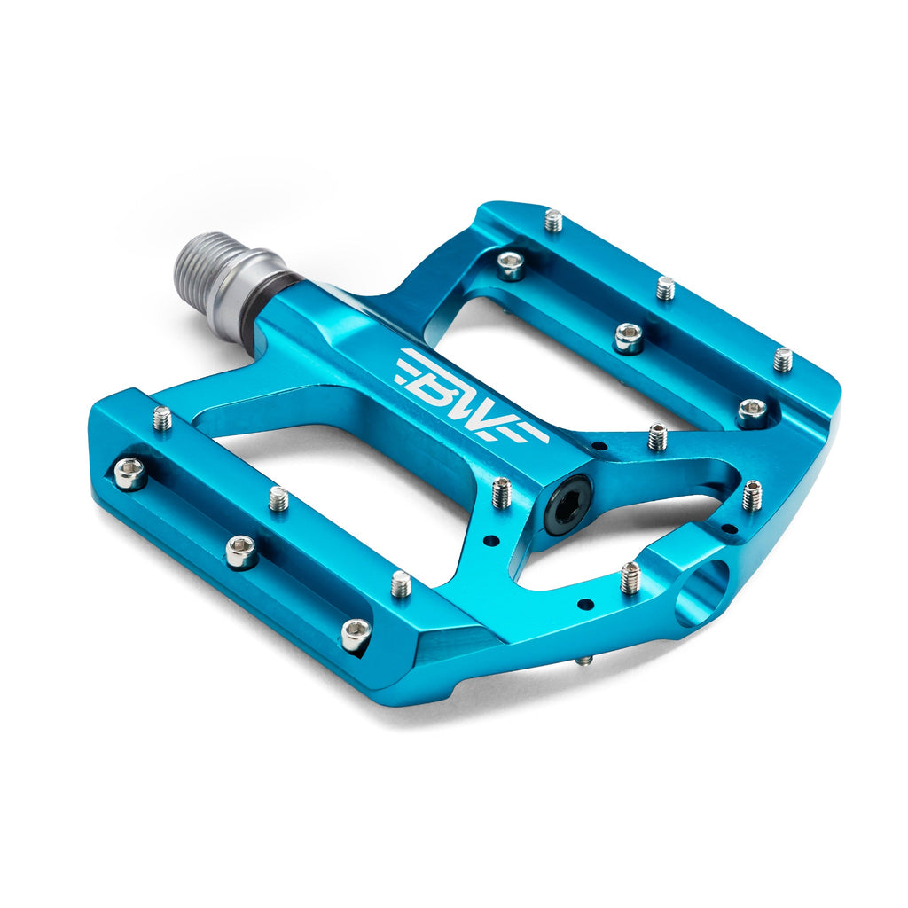 Light blue mountain bike pedal on white background. Corner view of mountain bike pedal.