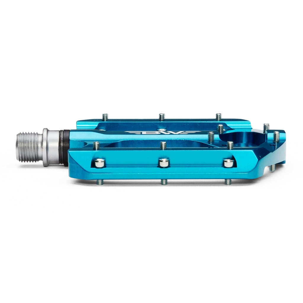 Light blue mountain bike pedal on white background. Front view of mountain bike pedal.