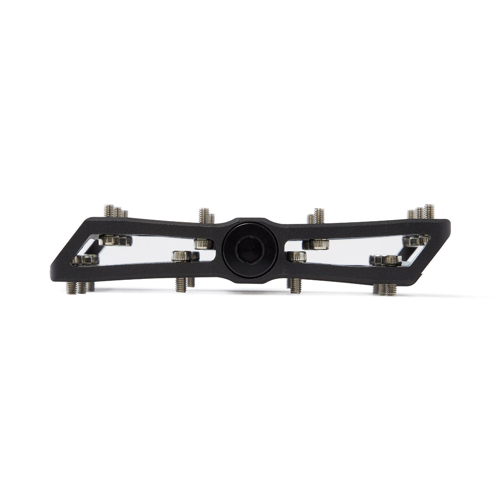 Large platform mountain bike pedal with replaceable traction pins.  Black pedal viewed from the front side on white background.