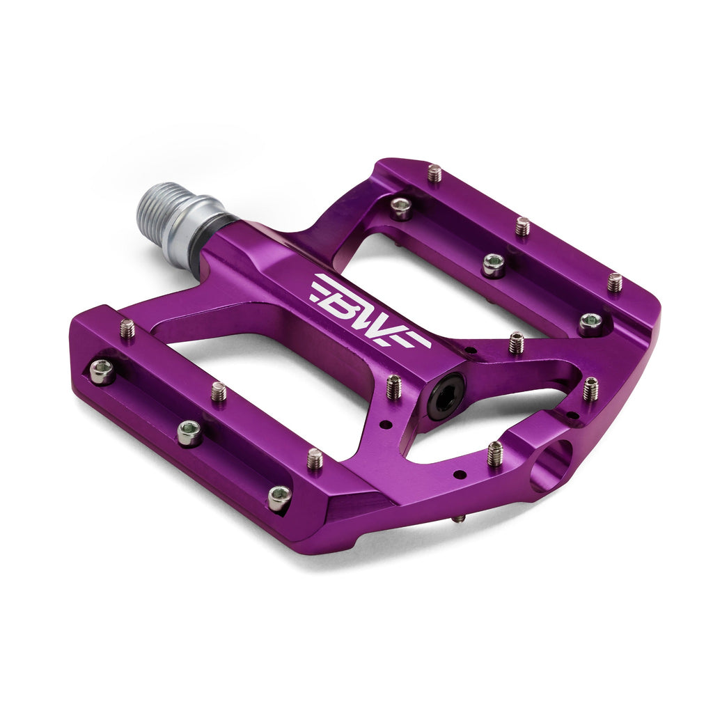 Purple mountain bike pedal on white background.