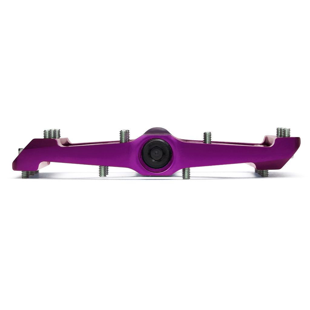 Purple mountain bike pedal on white background.