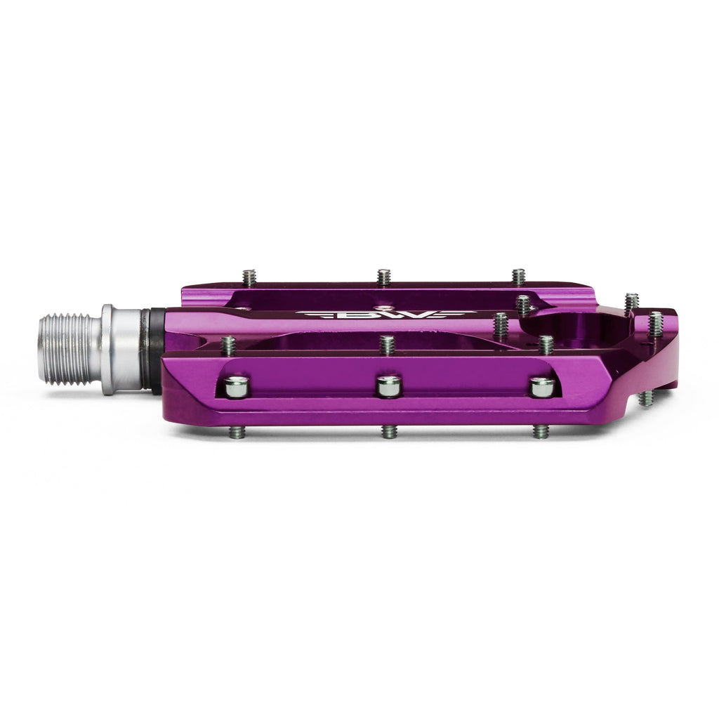 Purple mountain bike pedal on white background.