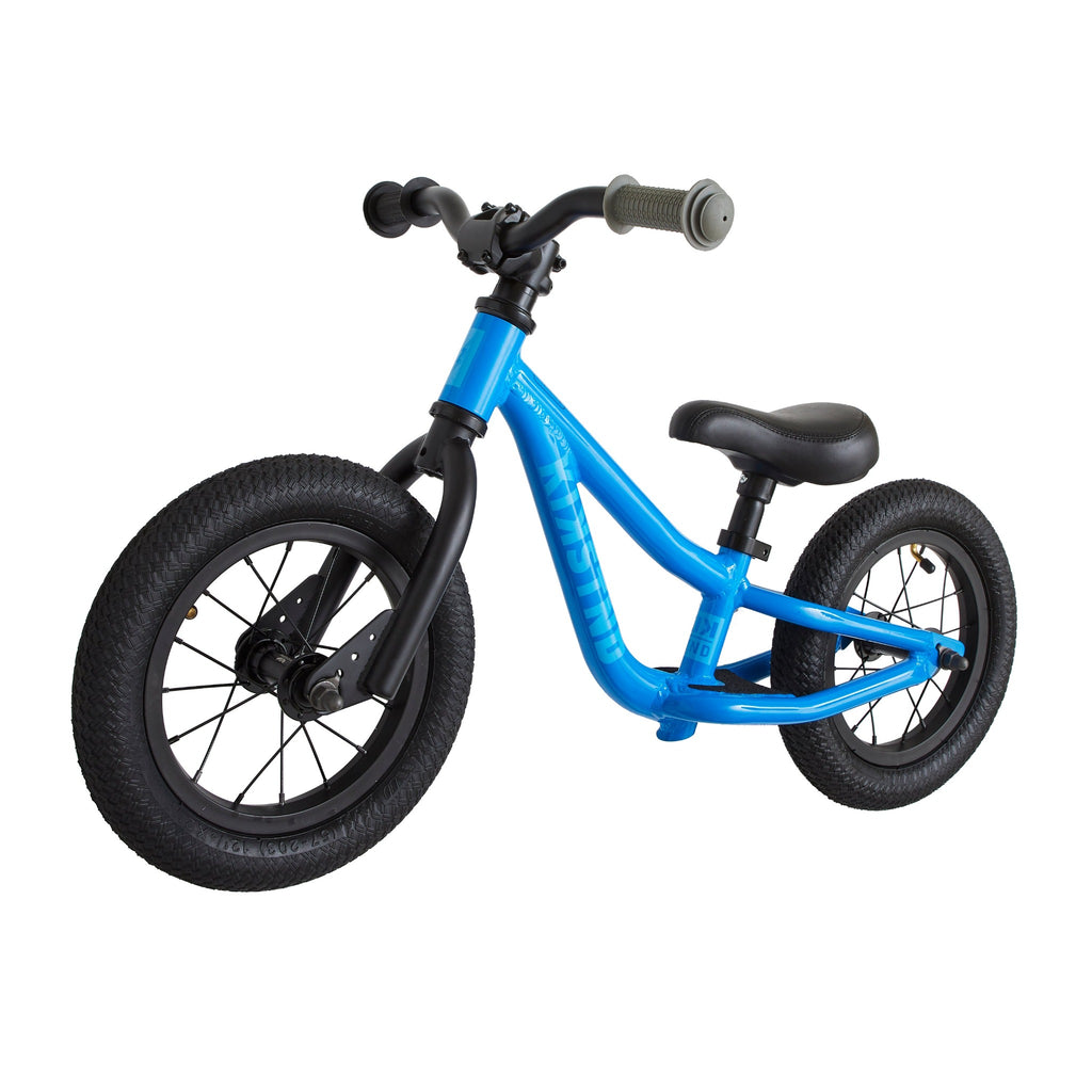 Balance bike for kids. Blue balance bike for kids on white background.