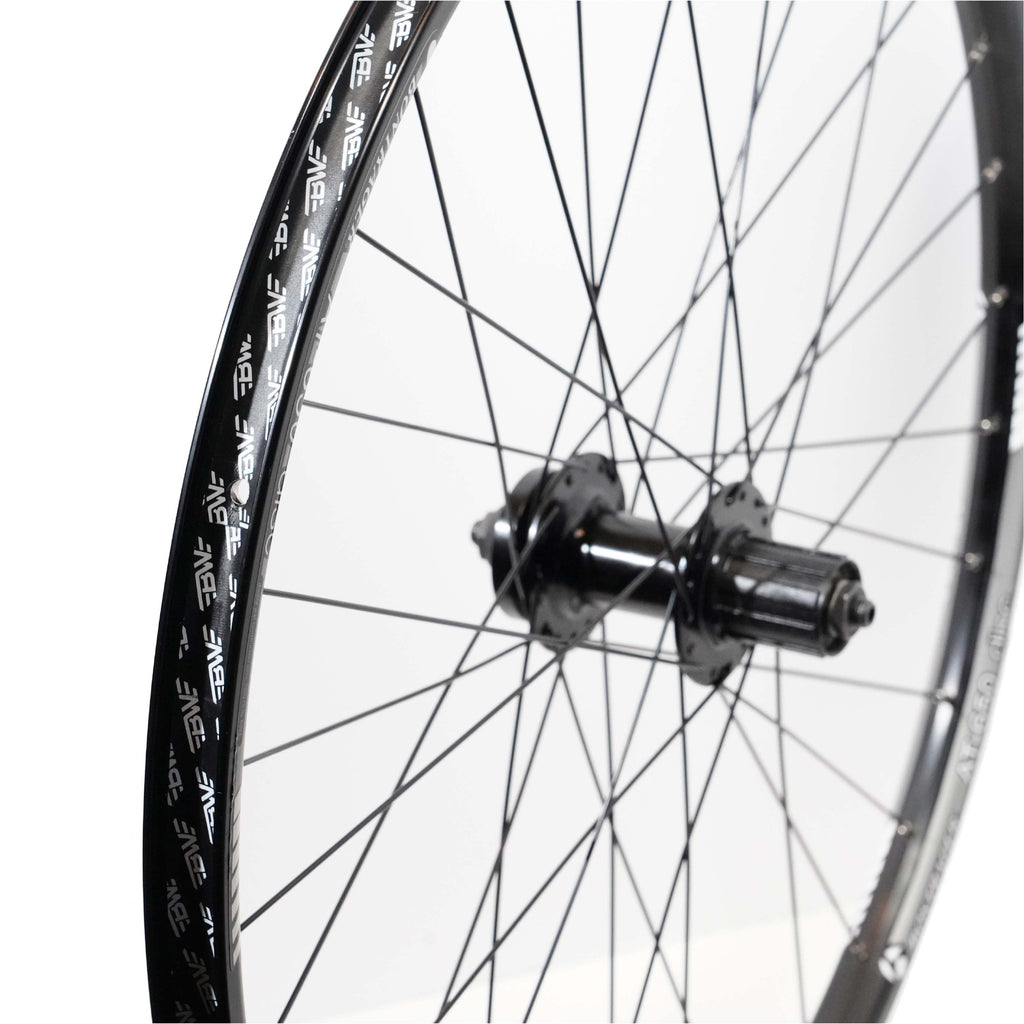 Black rim strip applied to bike wheel.