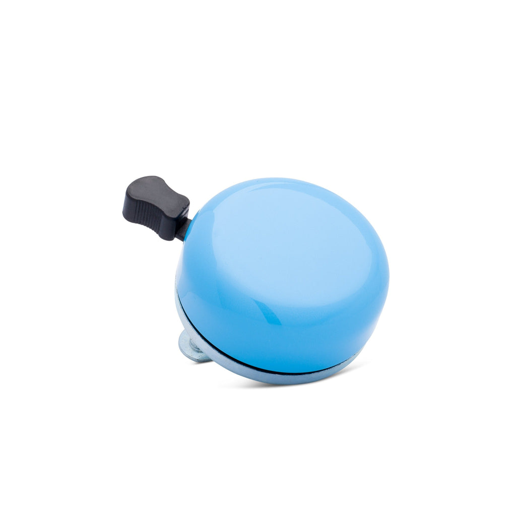 Classic bicycle bell in azure blue, corner view on white background. Vintage style bicycle bell.