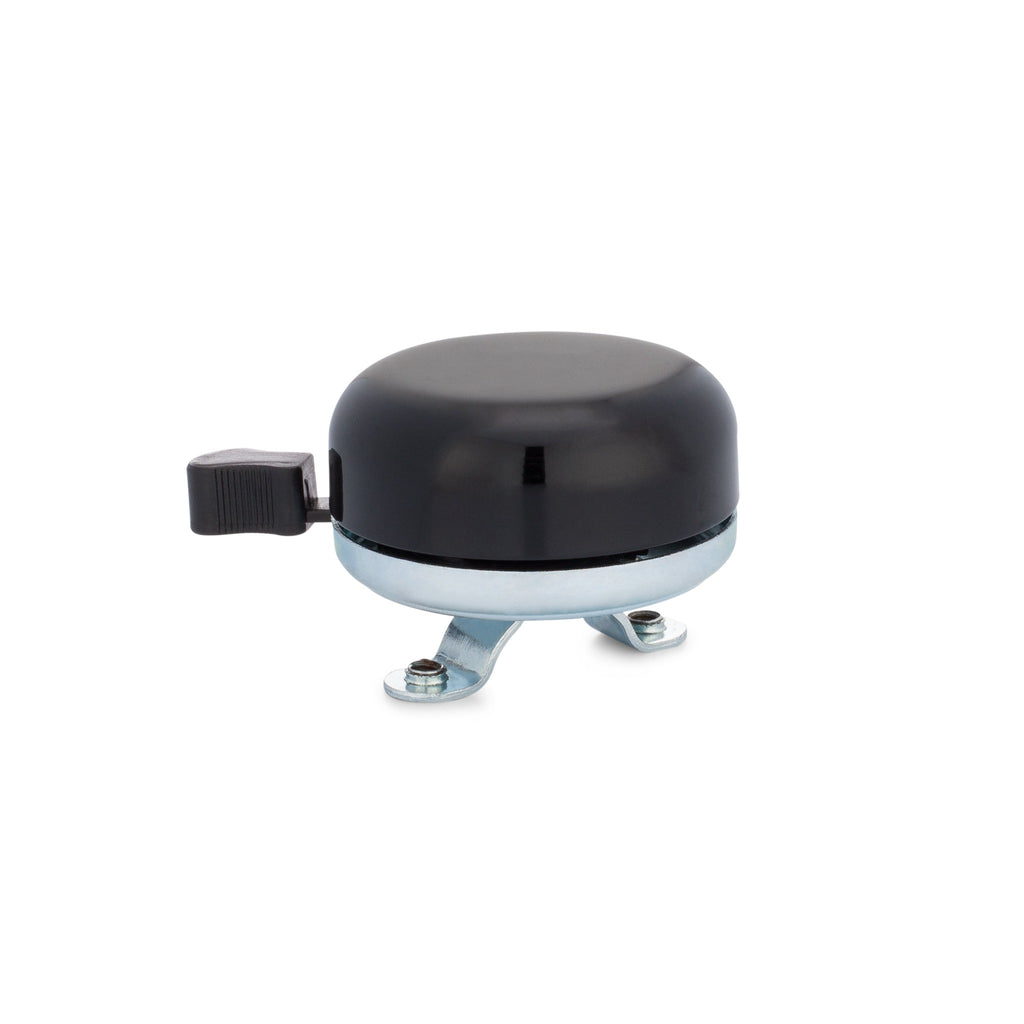 Classic bicycle bell black color, side view on white background. Vintage style bicycle bell.
