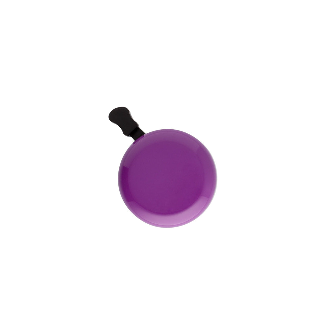 Classic bicycle bell color purple, top view on white background. Vintage style bicycle bell.