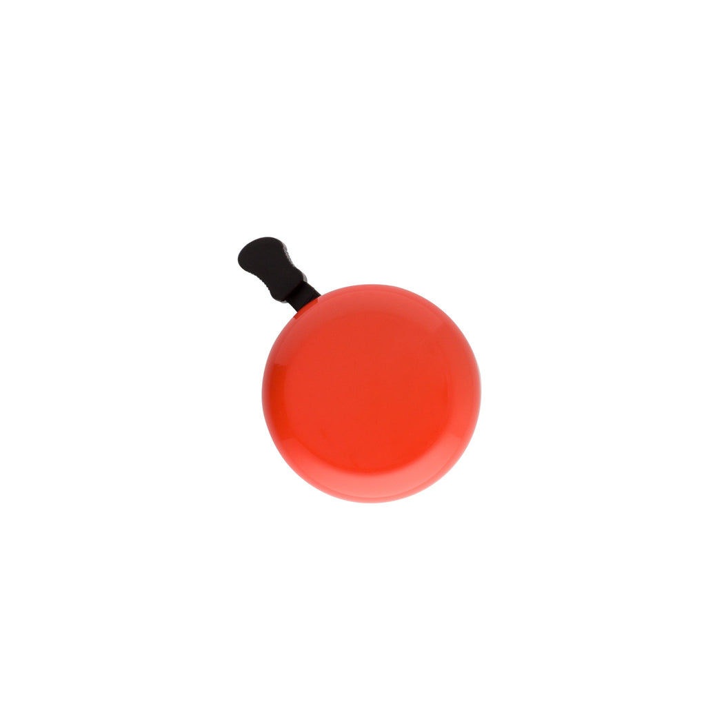 Classic bicycle bell color tangerine, top view on white background. Vintage style bicycle bell.