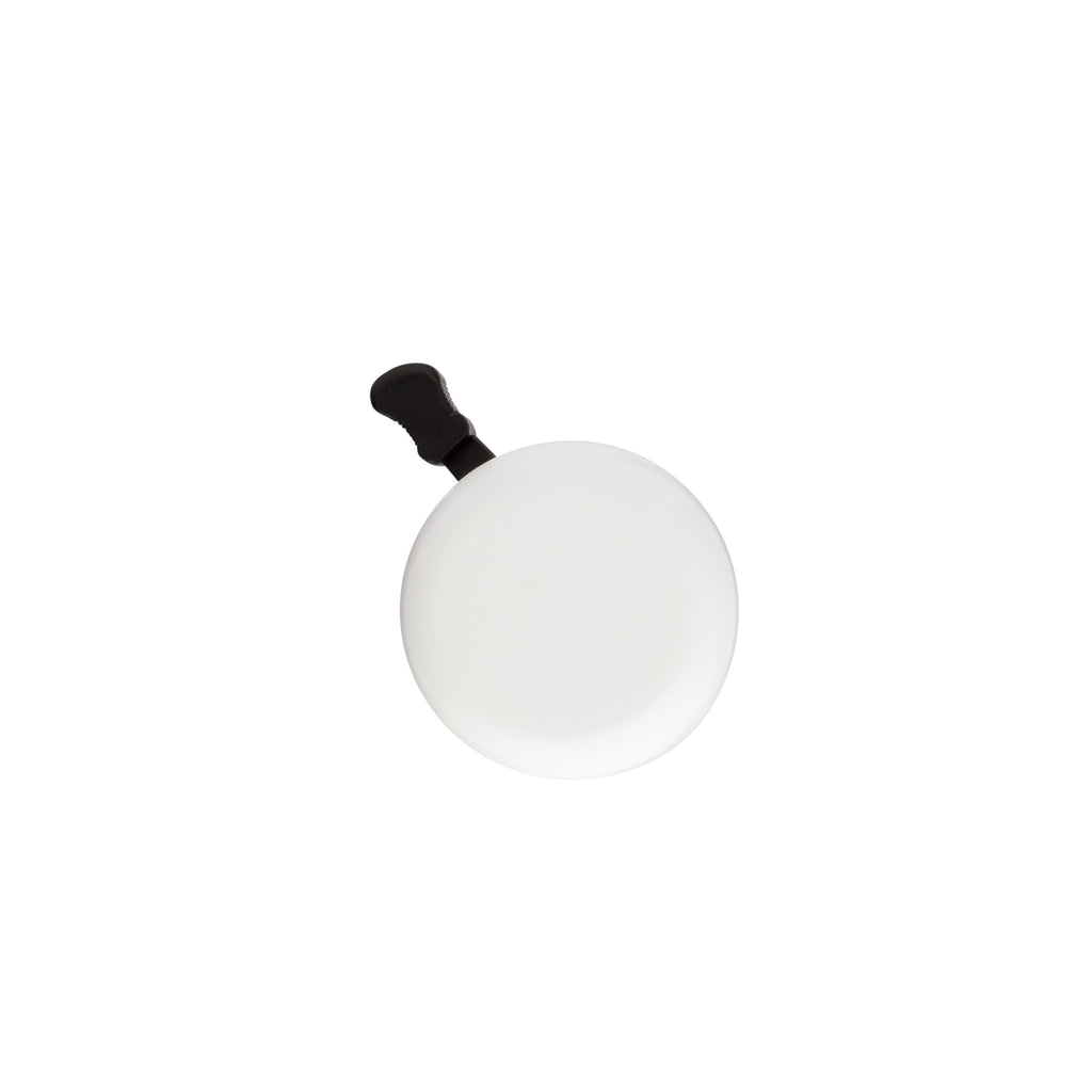 Classic bicycle bell color white, top view on white background. Vintage style bicycle bell.